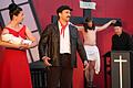 Empörend findet Don Camillo (Stefan Holm), dass der Säugling von Peppone (Markus Hennes) und Ariana (Elena Weber) auf den Namen Lenin getauft werden soll. Jesus (David Meyer) muss Schlimmeres verhindern.