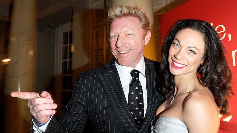 Lilly + Boris Becker - Boris Becker und seine Frau Lilly lächeln in die Kamera. Lilly + Boris Becker - Boris Becker und seine Frau Lilly lächeln in die Kamera.