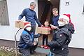 Leuchtende Kinderaugen bei der Übergabe der Lions Club-Weihnachtspakete.