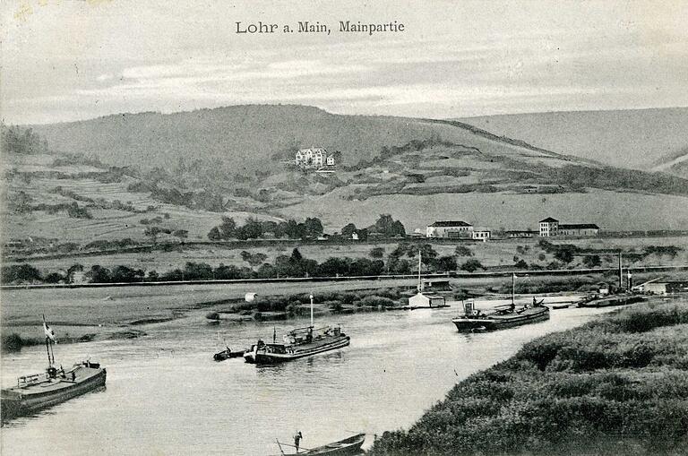 Eine Postkarte aus dem Jahr 1906: im Hintergrund der Lohrer Bahnhof und das damalige Luitpoldheim, das fünf Jahre vorher seinen Betrieb als Lungenheilanstalt aufgenommen hatte und seit 2005 als Hotel Franziskushöhe betrieben wird.