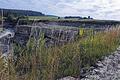 Nördlich des Mains liegt zwischen Schönbach und Breitbrunn einer der zahlreichen Sandsteinbrüche in den Haßbergen. Hier wird &bdquo;Weißgrauer Mainsandstein&ldquo; abgebaut, der in der Region und weit darüber hinaus Verwendung findet.