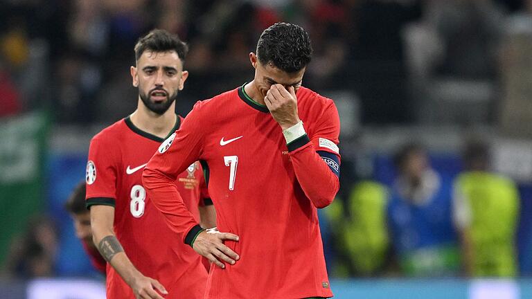 Cristiano Ronaldo       -  Ronaldo (r.) weinte nach seinem vergebenen Elfmeter in der Verlängerung.