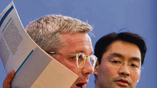 Die Solar-Kürzer Norbert Röttgen (links) und Philipp Rösler