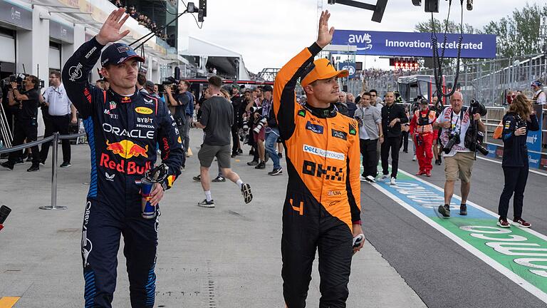 Max Verstappen (l) und Lando Norris       -  Max Verstappen (l) und Lando Norris.