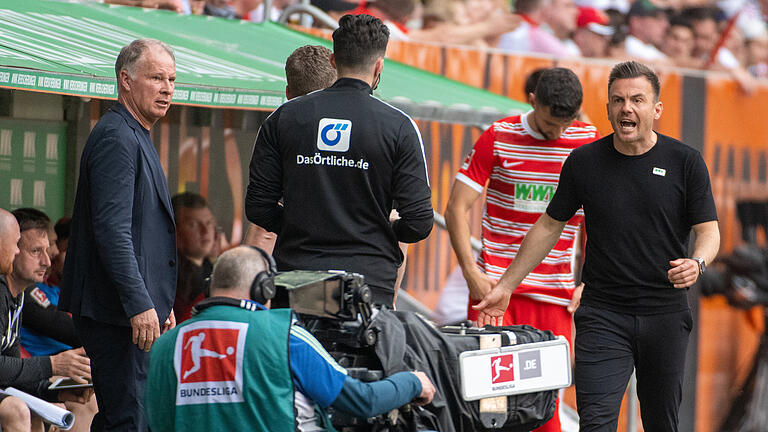 FC Augsburg - Borussia Dortmund.jpeg       -  Stefan Reuter (links) und Enrico Maaßen können mit der Saison nicht zufrieden sein.