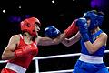 Paris 2024 - Boxen       -  Boxerin Imane Khelif (l) trifft ihre italienische Gegnerin mehrmals auf der Nase.