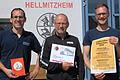 In Hellmitzheim wird vom 14. bis 16. Juni ein Dreier-Jubiläum gefeiert. Für ihre Vereine freuen sich auf das Festwochenende Stefan Wirsing (Feuerwehr), Walter Heintz (Sportverein) und Sebastian&nbsp;Schneider (Posaunenchor).