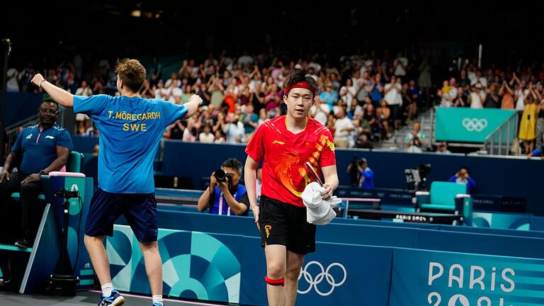 Paris 2024 - Tischtennis       -  Wang Chuqin ist fassungslos nach der Niederlage