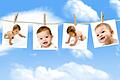 Babies       -  Photos of a baby, hanging on a clothes line against a cloudy sky