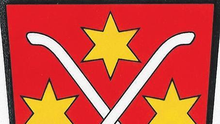 Drei Sterne und zwei gekreuzte Reuten: Das Dorfwappen von Westheim, reingezeichnet von Heribert Staufer.