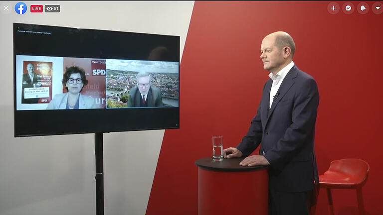 SPD-Kanzlerkandidat Olaf Scholz beim digitalen Wahlkampf. Mit dabei auf dem Bildschirm die Würzburger Bundestagskandidatin Freya Altenhöner und Landtagsabgeordneter Volkmar Halbleib.