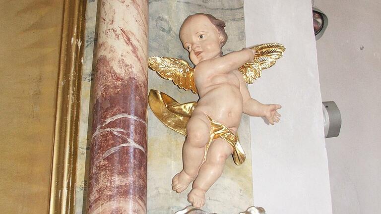 Wo die Engel schweben: die Barockkirche St. Michael und St. Georg in Michelau im Steigerwald. Wo die Engel schweben: die Barockkirche St. Michael und St. Georg in Michelau im Steigerwald.