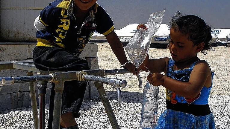 Wasser für 120 000 Menschen: Trinkwasserzapfstellen zu bauen, war eine wichtige Aufgabe Burgers.