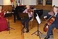 Jutta Müller Vornehm (Klavier), Susanne Aengeneyndt (Violine), Wolfram Schmidt (Viola) und Werner Jaksch (Violoncello) im historischen Rathaussaal in Bad Königshofen.