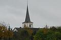 Weithin sichtbar in der Umgebung überragt die Echternadel der Filialkirche die Dachlandschaft Lindachs. Wenn sich das Bauernjahr dem Ende zuneigt, feiert der Kreuzpfadort seine Martini-Kirchweih.