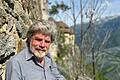 Reinhold Messner       -  Der Bergsteiger Reinhold Messner sitzt an seinem Schloss Juval auf einer Bank.