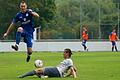 Marc Hänschke (links) vom FV 04 Würzburg springt über Felix Behnke von der SpVgg SV Weiden. In einer kampfbetonten Begegnung setzten sich die Würzburger durch.