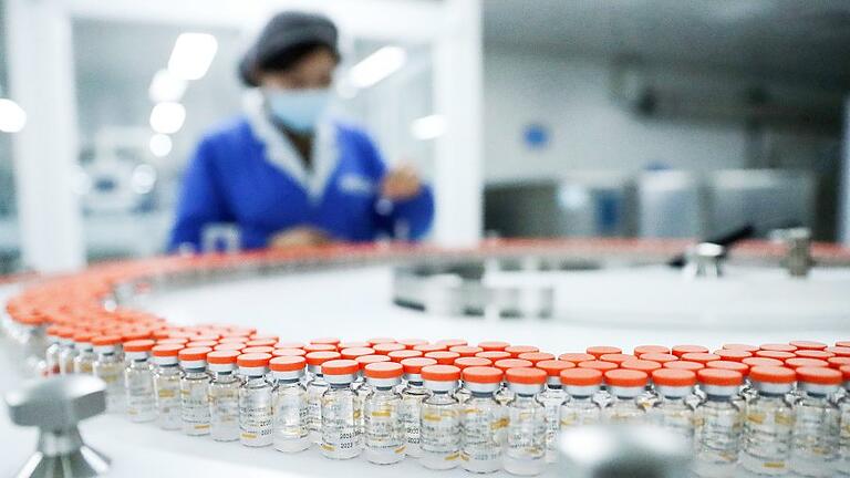 Coronavirus - China.jpeg - Die Produktion von Corona-Impfstoffen läuft auf Hochtouren. Die Nachfrage in Deutschland indes lässt nach. Was passiert mit den überzähligen Impfdosen? Coronavirus - China.jpeg - Die Produktion von Corona-Impfstoffen läuft auf Hochtouren. Die Nachfrage in Deutschland indes lässt nach. Was passiert mit den überzähligen Impfdosen?