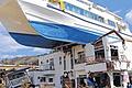 Nach Erdbeben und Tsunami in Japan: Ein Boot liegt auf einem schwer beschädigten Haus.