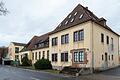 In den Bestandsgebäuden des früheren Butterwerks in Gerolzhofen sollen 21 Wohn- und vier Gewerbeeinheiten entstehen. Das Bild zeigt die Hauptfront des Komplexes entlang der Kolpingstraße.