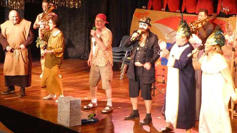 Die Musikclowns rundeten mit ihrer turbulenten Bühnenshow 'Der Vulkan sucht seine Opfer', die fast fünfstündige Prunksitzung ab. Auf dem Foto (Von links): Günter Birkner, Michael Dürr, Diana Gerhardt, Wolfgang Dürr, Oliver Goldfuß, Harald Ditzel, Philipp Pohli und Karin Lommel. Die Musikclowns rundeten mit ihrer turbulenten Bühnenshow 'Der Vulkan sucht seine Opfer', die fast fünfstündige Prunksitzung ab. Auf dem Foto (Von links): Günter Birkner, Michael Dürr, Diana Gerhardt, Wolfgang Dürr, Oliver Goldfuß, Harald Ditzel, Philipp Pohli und Karin Lommel.