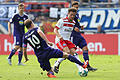 VfL Osnabrück - Hamburger SV       -  Fußball: DFB-Pokal, 1. Runde, VfL Osnabrück - Hamburger SV:  Der Osnabrücker Christian Groß (links) im Kampf um den Ball mit Nicolai Müller (rechts). Foto: Friso Gentsch/dpa