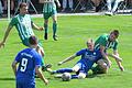 Kreisliga Rhön: FC Untererthal - TSV Trappstadt       -  Der Sitzfußballer trifft: In dieser Szene erzielt Trappstadts Luke Harth den Treffer zum 2:0-Endstand. Machtlos zuschauen müssen FC-Spielertrainer Sebastian Heinlein und Benedikt Hüfner.