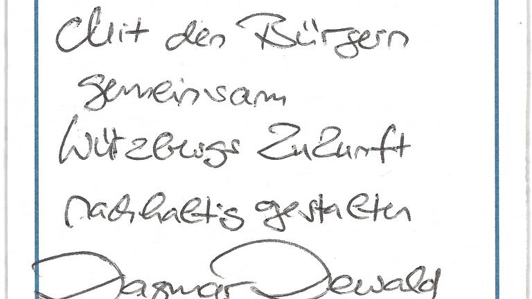 Dewalds Wahlprogramm auf einem Bierdeckel zusammengefasst: 'Mit den Bürgern gemeinsam Würzburgs Zukunft nachhaltig gestalten.'