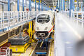 DB - ICE-Werk.jpeg       -  Ein ICE steht in einer Wartungshalle. Der Umbau der Bahn wird kontrovers diskutiert.