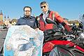 Auf dem Motorrad nach Afrika       -  Jetzt kann es losgehen: Christian Ebert (links) und Dieter Schneider stehen mit Landkarte und Motorrad auf der Alten Mainbrücke in Würzburg. Schneider ist mit der Maschine, die vom Motorradhaus Ebert zur Verfügung gestellt wurde, zu einer dreimonatigen Tour nach Afrika aufgebrochen.