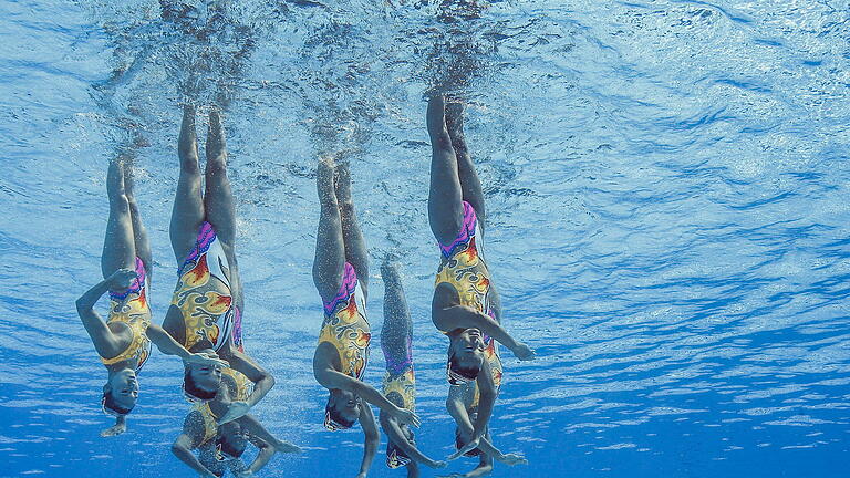 82943409.jpg       -  Synchronschwimmen ist wieder bei Olympia 2024 mit dabei. In diesem Artikel lesen Sie alle Infos rund um Termine, Zeitplan und Übertragung.