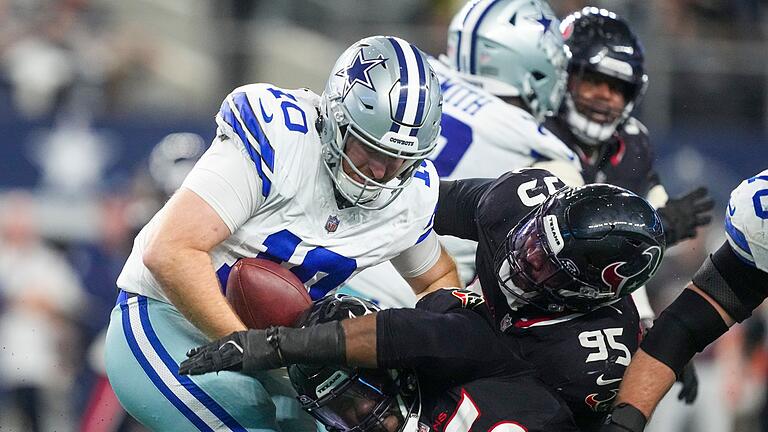 Dallas Cowboys - Houston Texans       -  Cowboys-Quarterback Cooper Rush erlebte mit fünf Sacks einen schmerzhaften Abend.