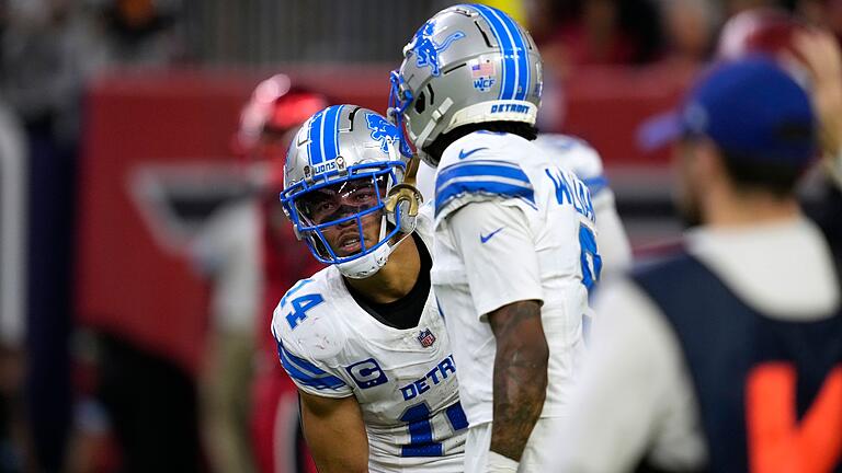 Houston Texans - Detroit Lions       -  Amon-Ra St. Brown (l.) erzielte seinen siebten Touchdown der Saison.