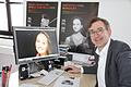 Intendant Tilman Schlömp freut sich unter anderem auf Sopranistin Julia Lezhneva (Foto auf dem Bildschirm), die als 'Artist in Residence' gleich drei Konzerte beim diesjährigen Kissinger Sommer geben wird. Für Schlömp steht sie 'an der Schwelle zum Weltstar'. Foto: Ralf Ruppert       -  Intendant Tilman Schlömp freut sich unter anderem auf Sopranistin Julia Lezhneva (Foto auf dem Bildschirm), die als 'Artist in Residence' gleich drei Konzerte beim diesjährigen Kissinger Sommer geben wird. Für Schlömp steht sie 'an der Schwelle zum Weltstar'. Foto: Ralf Ruppert