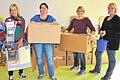 Umzugskartons sind inzwischen ausgeräumt: Mit dem Umzug der Kinderkrippe Anfang Oktober 2014 begann der Betrieb im Kinderland in Bad Königshofen. Im Bild Kindergartenleiterin Karin Imkeller (links) und einige Helferinnen.FOTO: Regina Vossenkaul