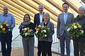 Im Bild (von links): Vorne die Geehrten Roger Belling, Michaele Bernhard, Angelika Hofmann und Elisabeth Spies gemeinsam mit Ralf Herre und Landrat Florian Töpper.