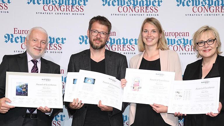 2.Tag European Newspaper Congress 2017 - Preisübergabe: Gastgeber Norbert Küpper mit den Main-Post-Mitarbeitern Daniel Biscan (Art Director komm.) und Meike Rost (Art Director Video) sowie die Chefredakteurin des Medium Magazins Annette Milz (von links) 2.Tag European Newspaper Congress 2017 - Preisübergabe: Gastgeber Norbert Küpper mit den Main-Post-Mitarbeitern Daniel Biscan (Art Director komm.) und Meike Rost (Art Director Video) sowie die Chefredakteurin des Medium Magazins Annette Milz (von links)