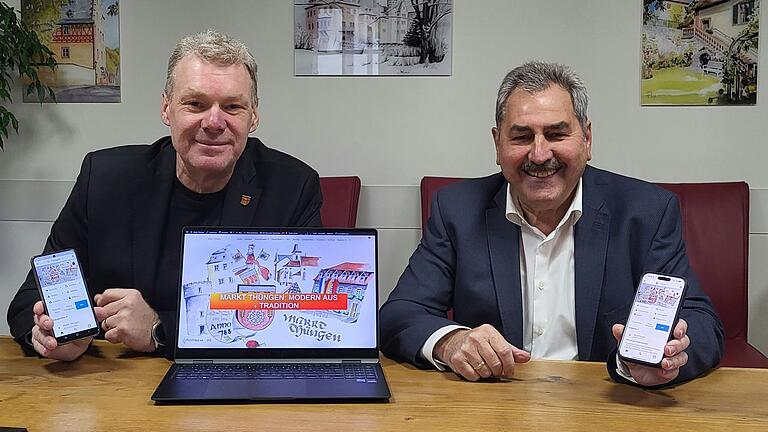 Bürgermeister Lorenz Strifsky (rechts) und sein Stellvertreter Wolfgang Heß präsentieren die Heimat-App für die Markt Thüngen. Bürgermeister Lorenz Strifsky (rechts) und sein Stellvertreter Wolfgang Heß präsentieren die Heimat-App für die Markt Thüngen.