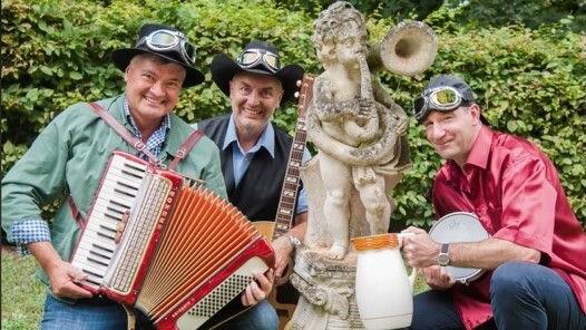 Konzert mit den Mouschdpiloten mit Kurt Klawitter, Gil Weidkuhn und Thomas Baaken.