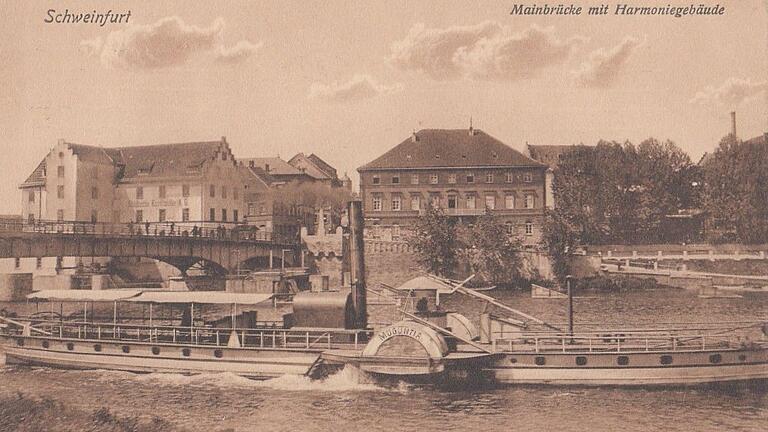 Um 1910 festgehalten: Blick auf Mainbrücke und Harmoniegebäude Um 1910 festgehalten: Blick auf Mainbrücke und Harmoniegebäude