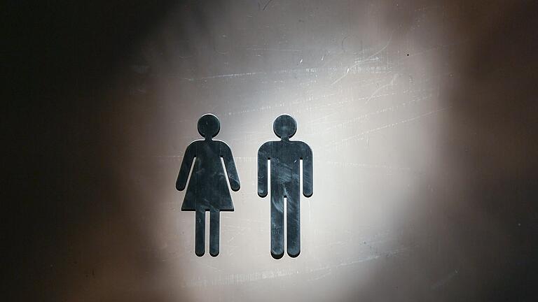 Piktogramme einer Frau und eines Mannes       -  Menschen mit Dranginkontinenz müssen plötzlich auf die Toilette und können den Urin oft nicht mehr zurückhalten.