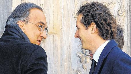 Abkehr von Italien: Fiat-Präsident John Elkann (rechts) und Fiat-Konzernchef Sergio Marchionne in Turin.