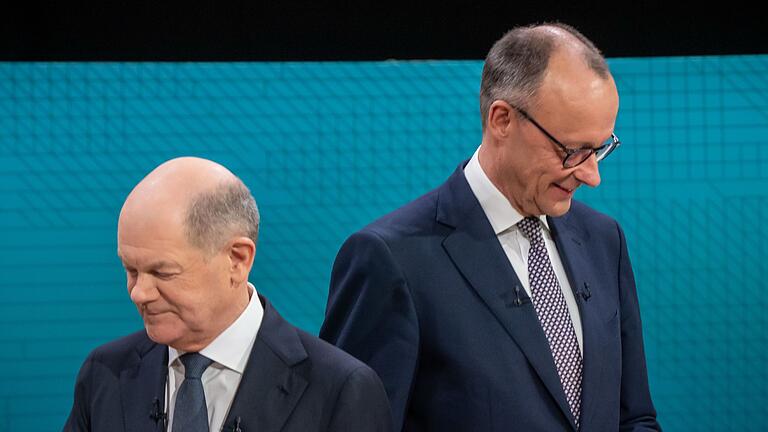 Scholz und Merz im TV-Duell       -  Es kann nur einen geben: Zusammen wollen Friedrich Merz (CDU) und Olaf Scholz (SPD) nicht in ein Kabinett. Zu einer Koalition ihrer Parteien könnte es trotzdem kommen. (Archivbild)