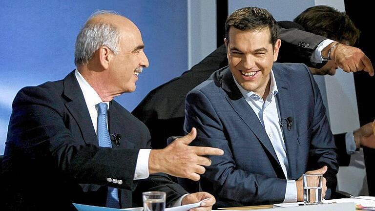 Vor der Parlamentswahl in Griechenland       -  Kontrahenten: der Linke und Ex-Regierungschef Alexis Tsipras (rechts) und der Konservative Vangelis Meimarakis.