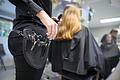 Friseurin       -  Eine Friseurmeisterin schneidet einer Kundin die Haare.