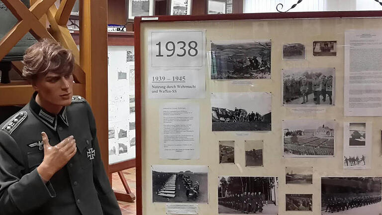 In der militärhistorischen Sammlung in Wildflecken sind unter anderem eine Wehrmachtsuniform und Bilder aus der Zeit des Dritten Reiches ausgestellt. Foto: Rolf Pralle/Archiv       -  In der militärhistorischen Sammlung in Wildflecken sind unter anderem eine Wehrmachtsuniform und Bilder aus der Zeit des Dritten Reiches ausgestellt. Foto: Rolf Pralle/Archiv