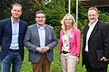 Geschäftsführer Philipp Zippe (von links), Landrat Christoph Schauder, Dezernentin Ursula Mühleck und Gesamtbereichsleiter Technik Andreas Emrich beim Besuch bei der Firma Zippe Industrieanlagen in Wertheim.