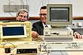 Dr. Matthias Reichling und Matthias Funken, Leiter des Rechenzentrums, mit Computer-Dinosauriern aus den Anfangsjahren des Internets und World Wide Webs.