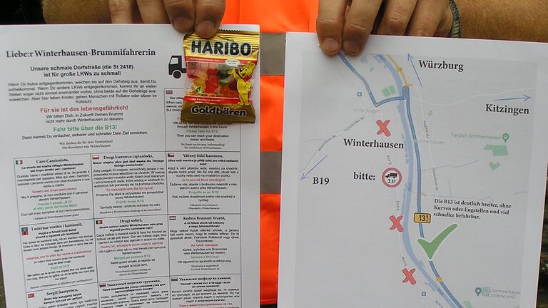 Handzettel mit Appellen in elf Sprachen, garniert mit Gummibärchen, verteilte der Arbeitskreis Mobilität Winterhausen an Brummifahrer, um ihnen die von Ortsdurchfahrten freie Alternativroute über die B 13 schmackhaft zu machen. Handzettel mit Appellen in elf Sprachen, garniert mit Gummibärchen, verteilte der Arbeitskreis Mobilität Winterhausen an Brummifahrer, um ihnen die von Ortsdurchfahrten freie Alternativroute über die B 13 schmackhaft zu machen.