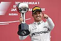 Sieg       -  Nico Rosberg jubelt über seinen Sieg beim Großen Preis von Japan. Foto: Franck Robichon